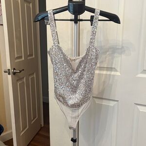 Elegant Silver Sequin Bodysuit new with tags never worn